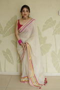 Cream Soft Tissue Saree with Pink & Gold Zari Border