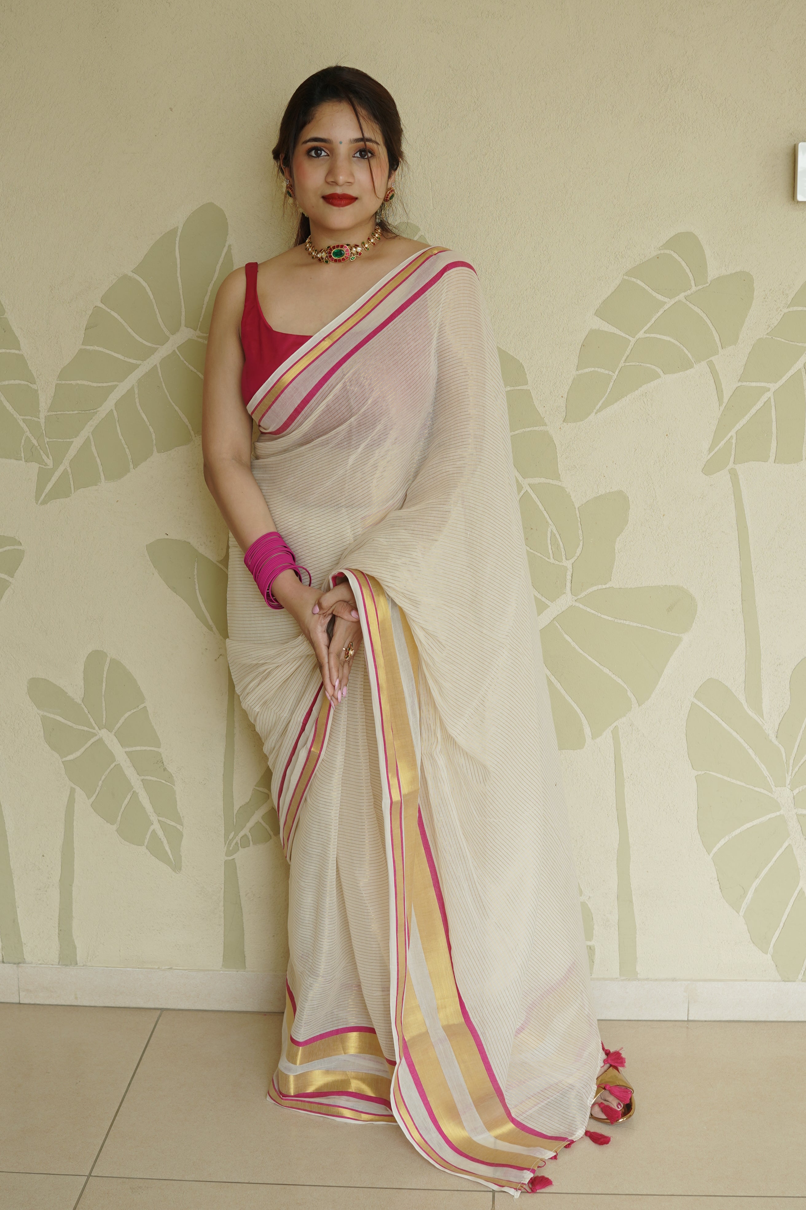 Cream Soft Tissue Saree with Pink & Gold Zari Border