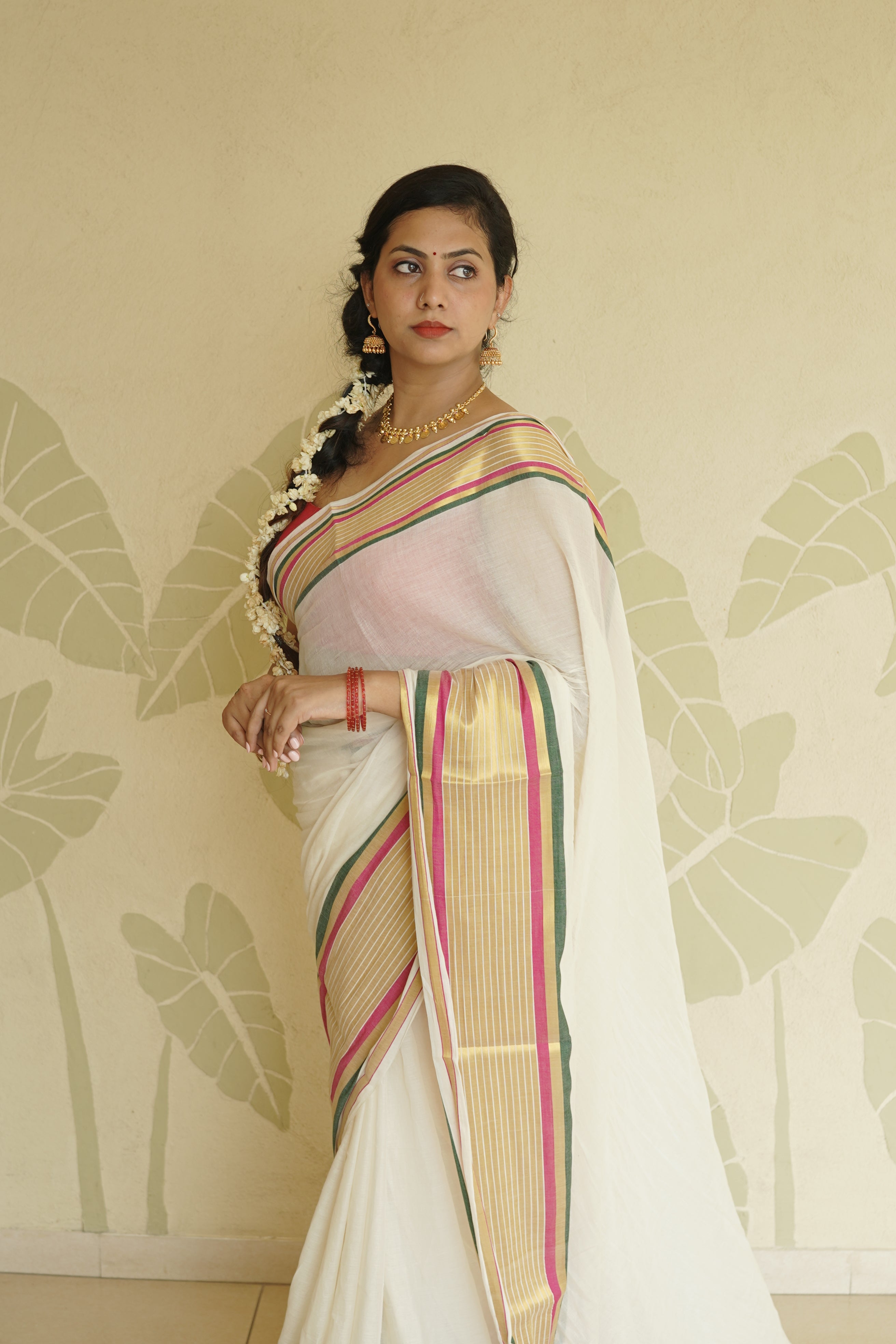 Off-White Cotton Saree with Multi-Color Zari Stripe Border