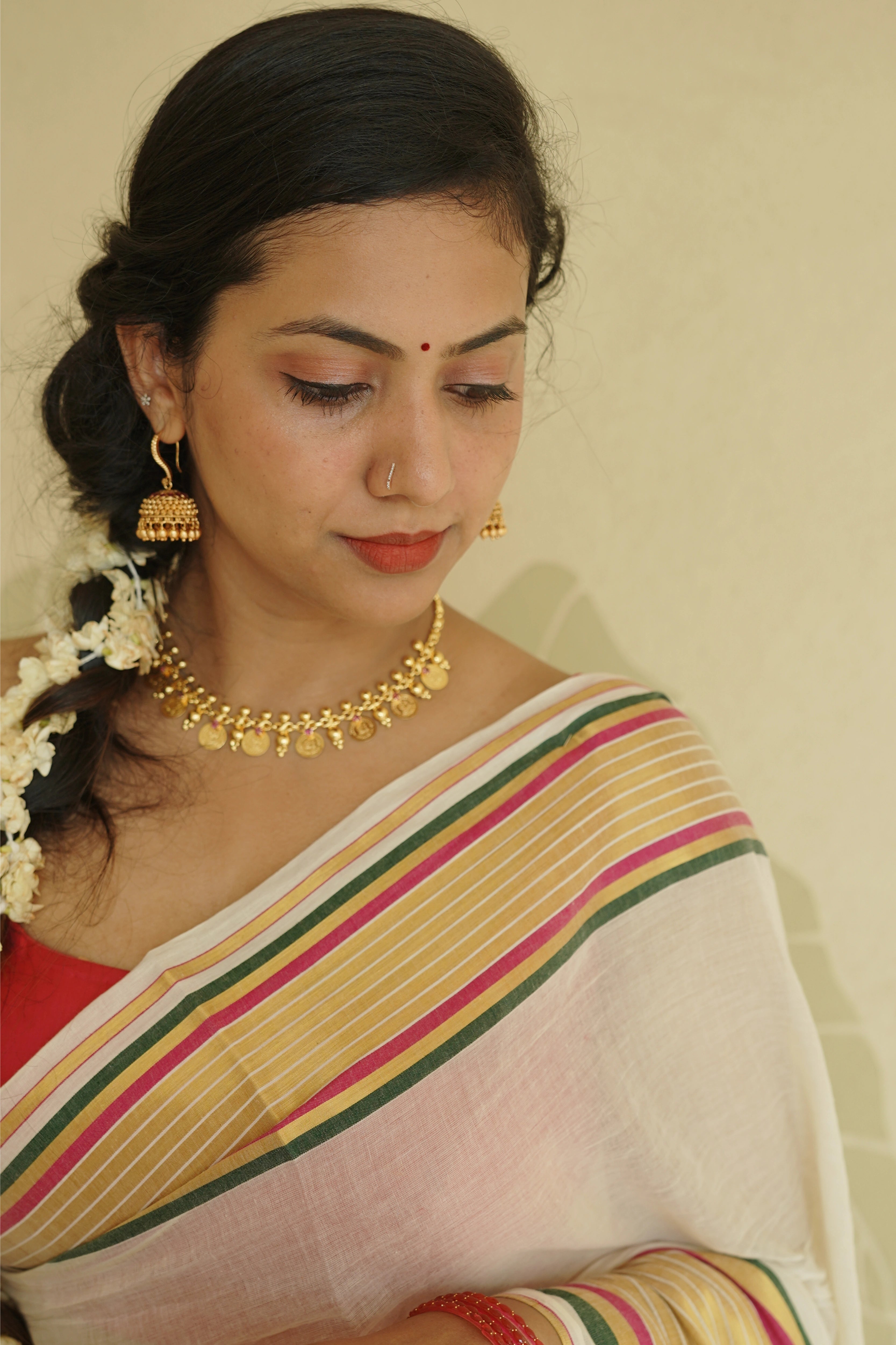 Off-White Cotton Saree with Multi-Color Zari Stripe Border