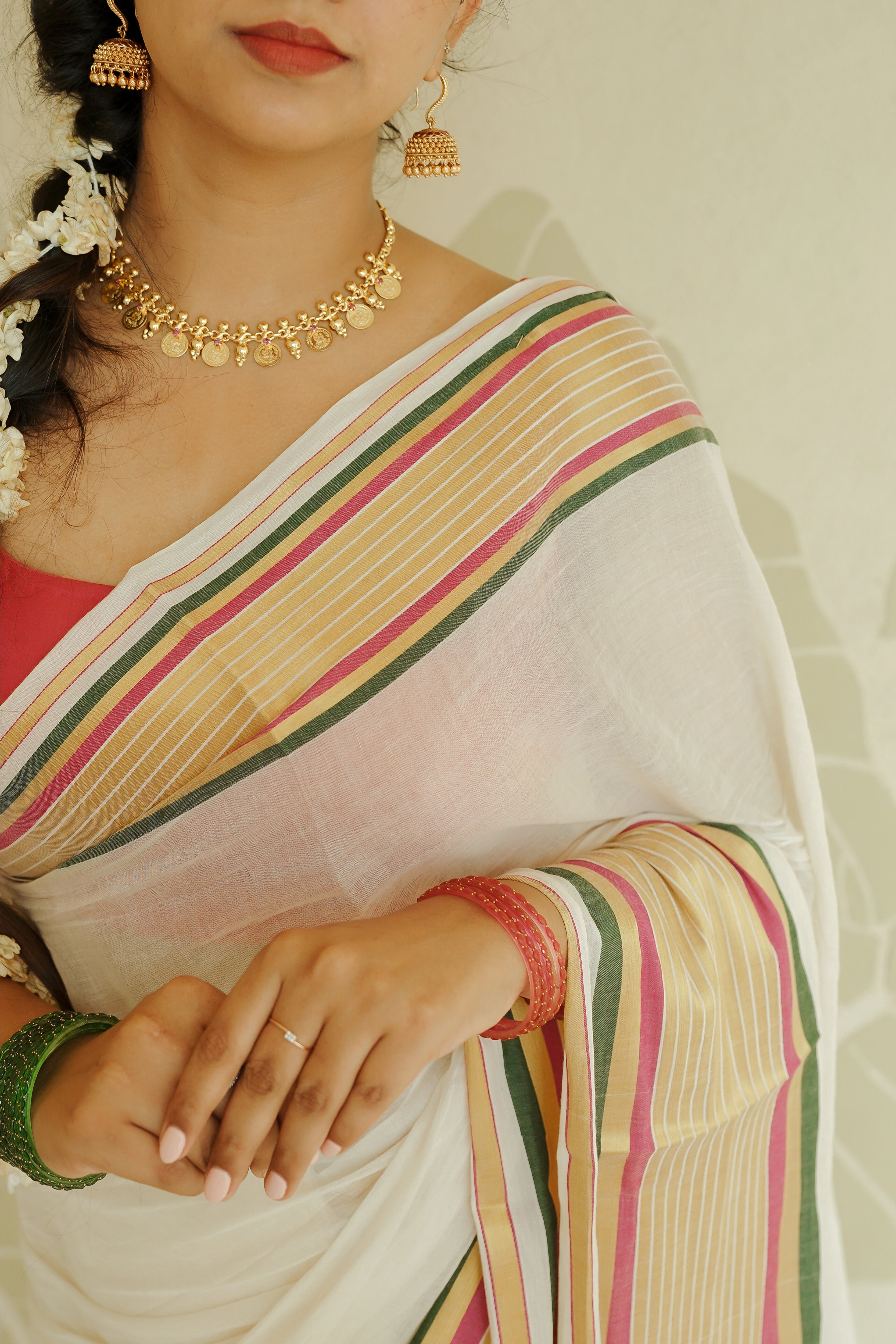 Off-White Cotton Saree with Multi-Color Zari Stripe Border
