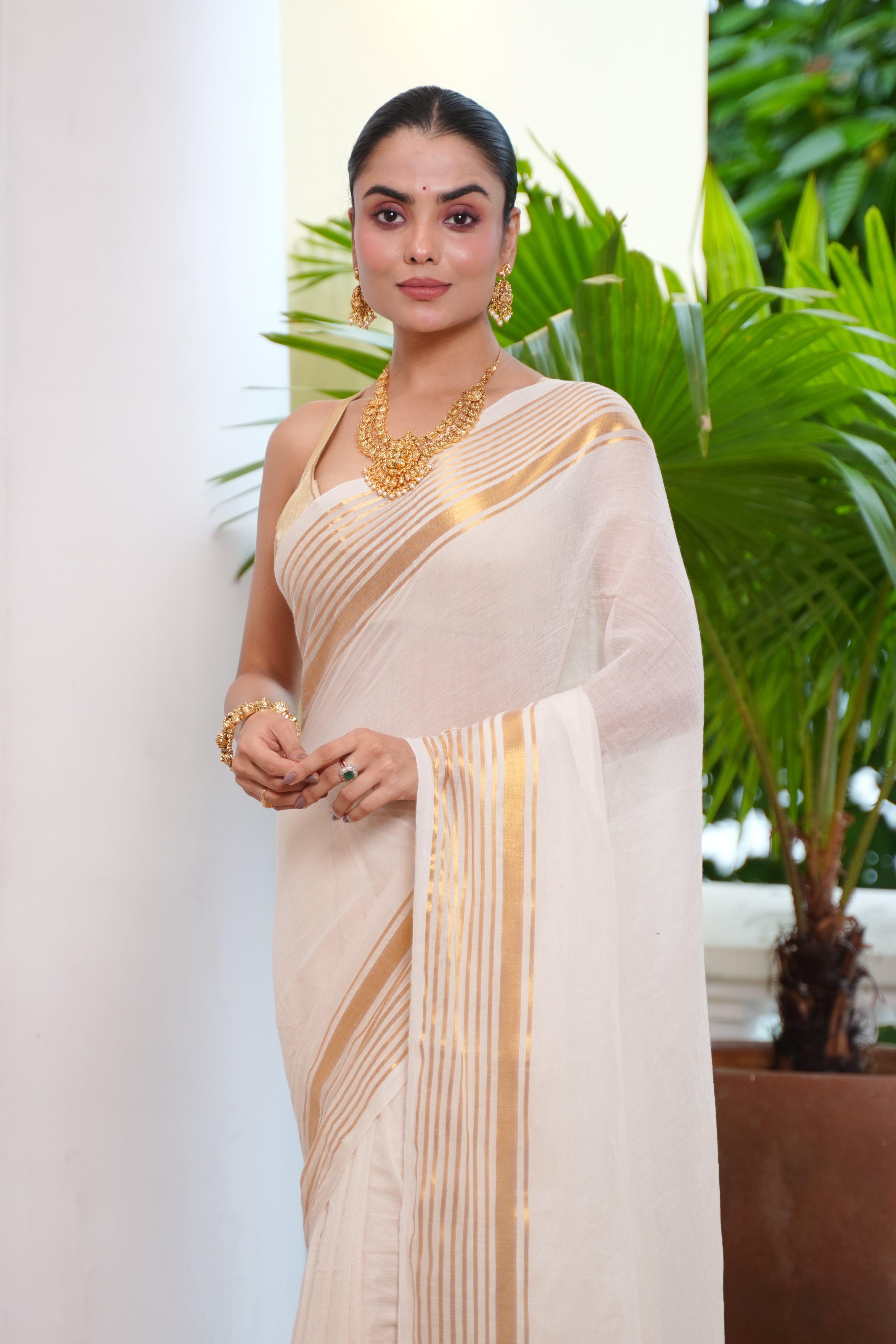 Ivory & Gold Tissue Silk Saree with Zari Stripe Border